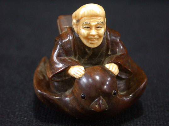 win0013 Japanese Wood Ivory Netsuke Man Ride Bird