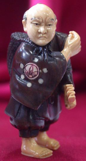 win3054 ebony iron mammoth ivory netsuke man hold fan